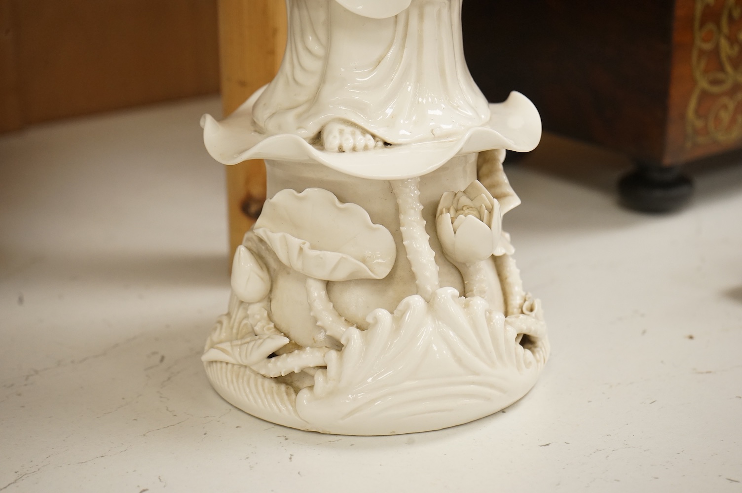 A Chinese blanc de chine figure of Guanyin, 42cm high